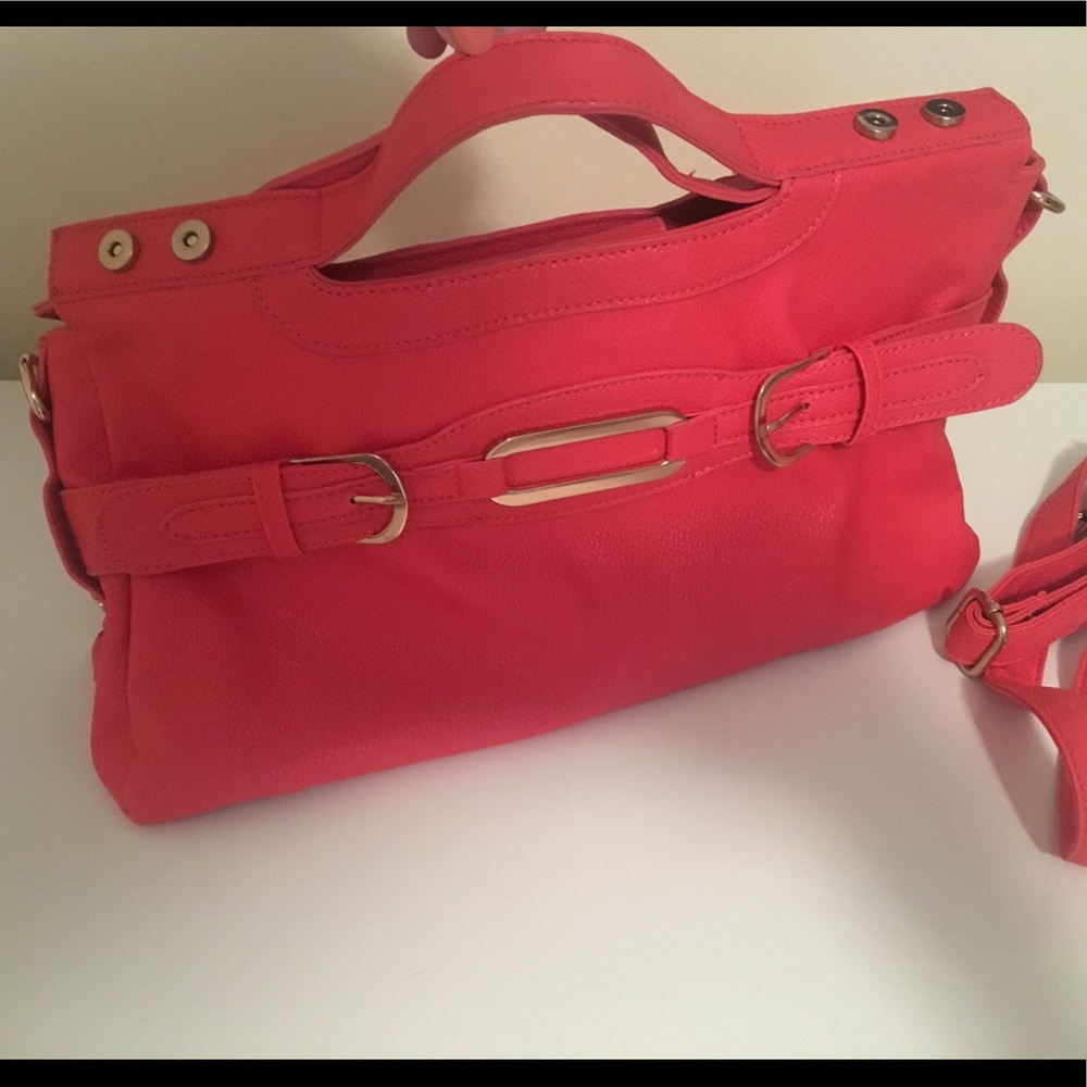 Charming Charlie’s coral purse w/detachable strap.
